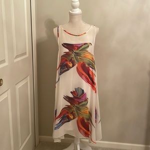 White chiffon sleeveless dress with colorful prints. Knee high!
